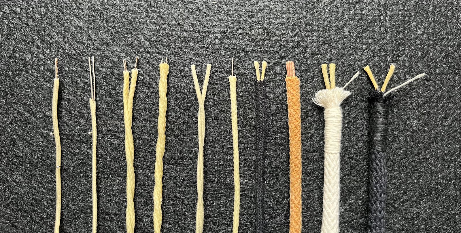 Ten different Dogma Cables builds and inner conductors laid out side by side